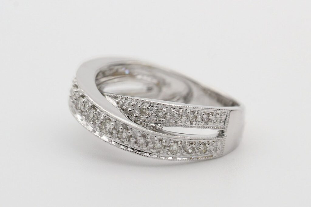A white gold ring set with rows of diamonds