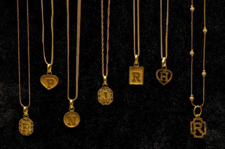 Gold initial pendants on chains