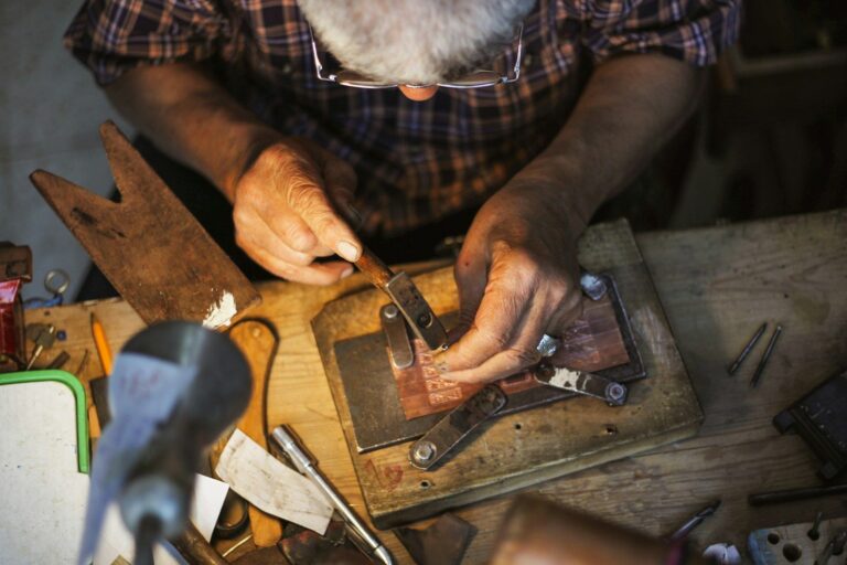 Goldsmith working at a workbench