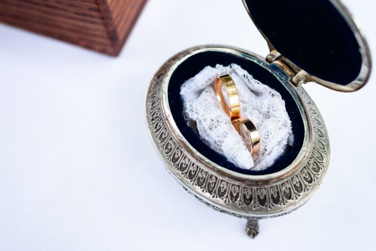 Heirloom gold rings in a vintage silver ring box