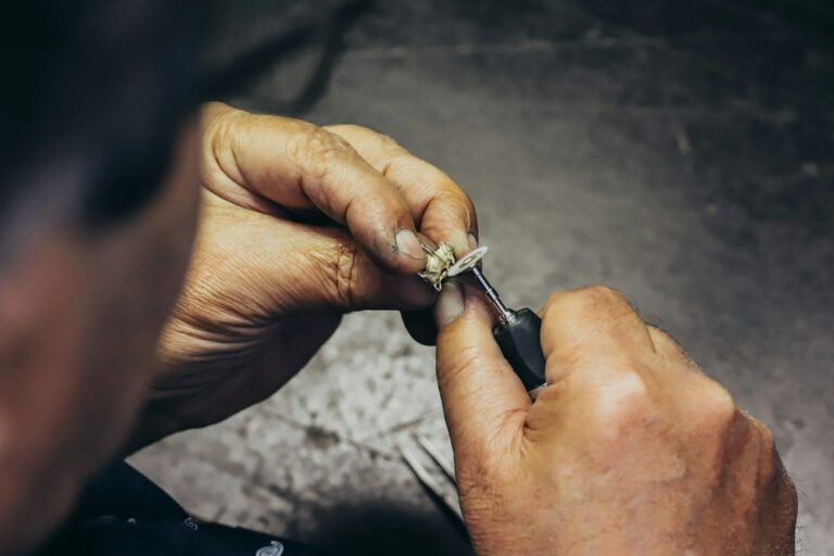 Jeweller working on a ring setting