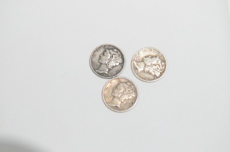 Three old silver dimes
