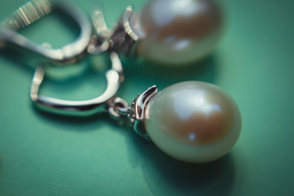 Close-up of pearl drop earrings