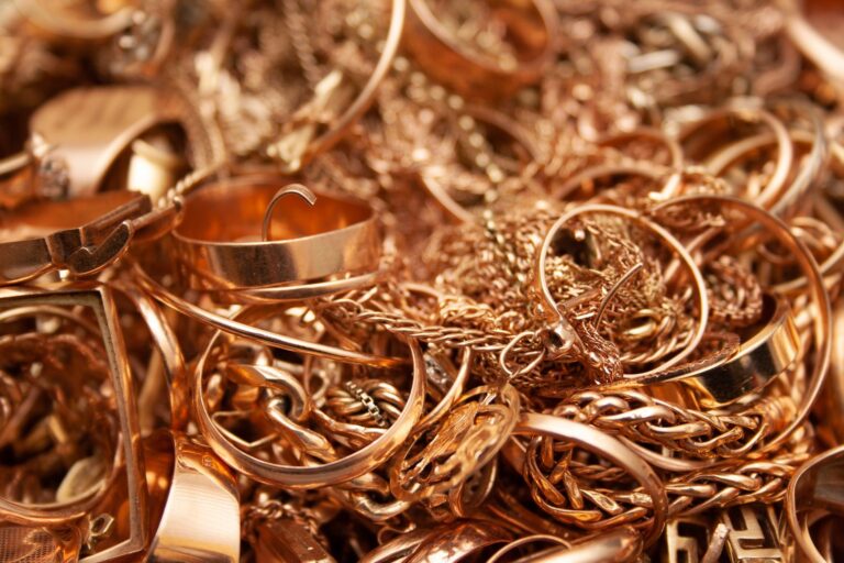 Pile of old and broken gold jewellery
