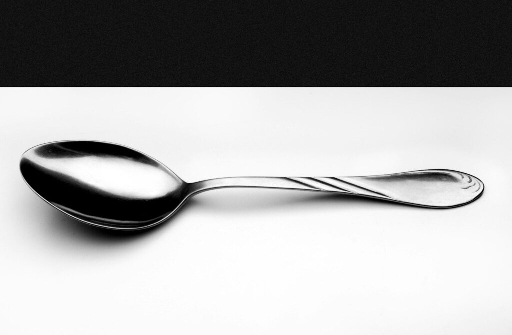 A polished silver spoon