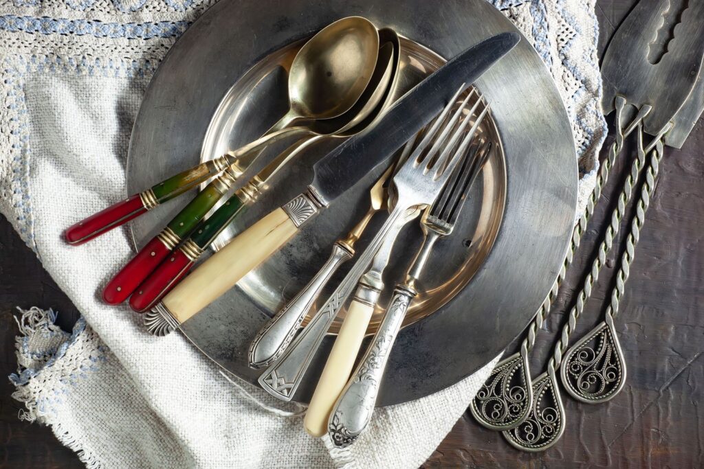 Silver and silver-plated flatware with bone handles