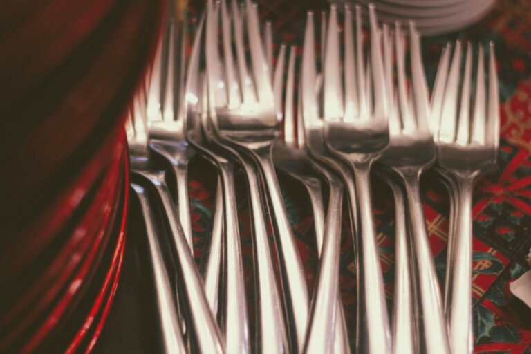 A row of silver forks