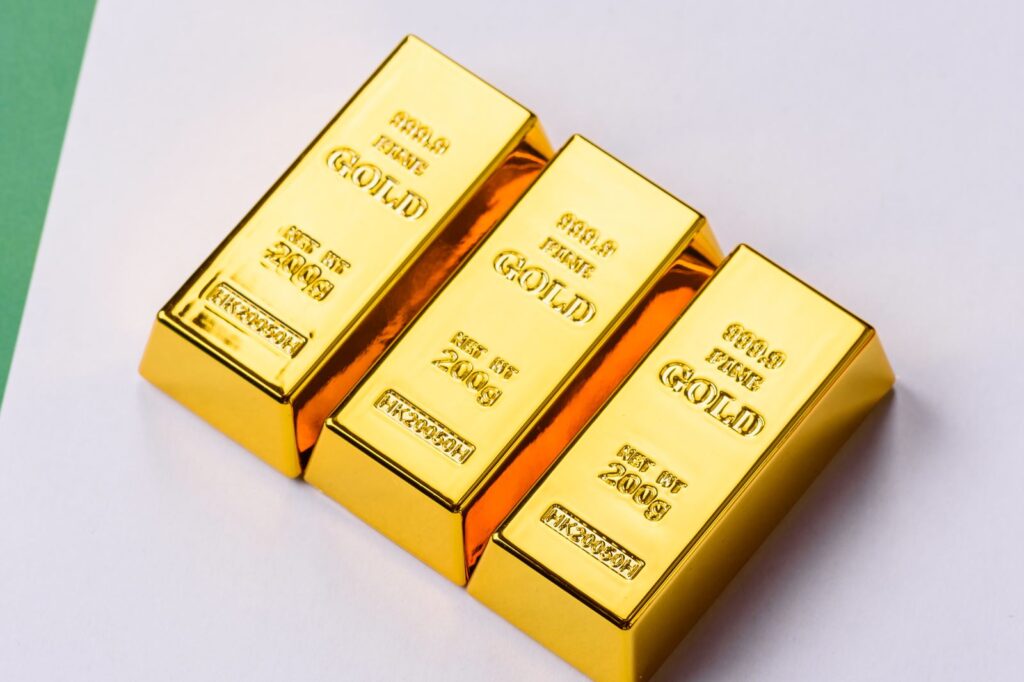 Three small 200-gram gold bars stamped 999.9 fine gold