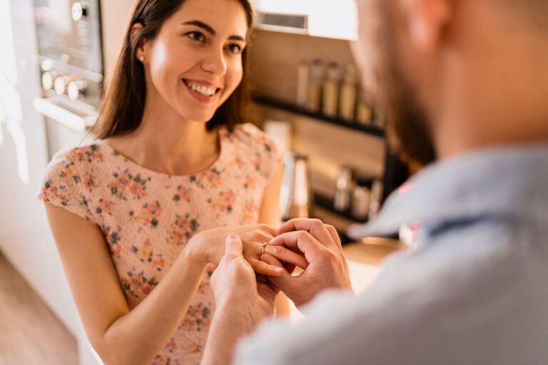 Woman trying on a ring to check the fit